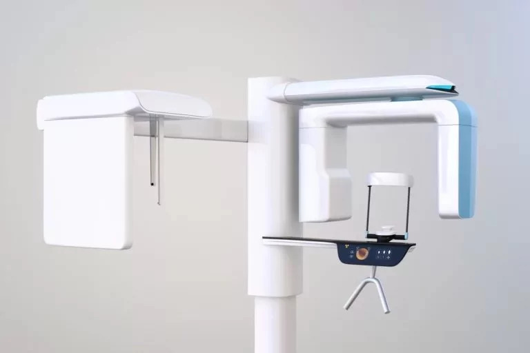 Panoramic dental X-ray machine used for capturing detailed images of a patient's entire mouth.