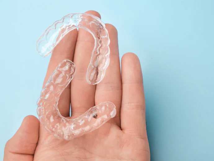 Dental retainers in Oak Lawn, IL at Roots Dental Studio.