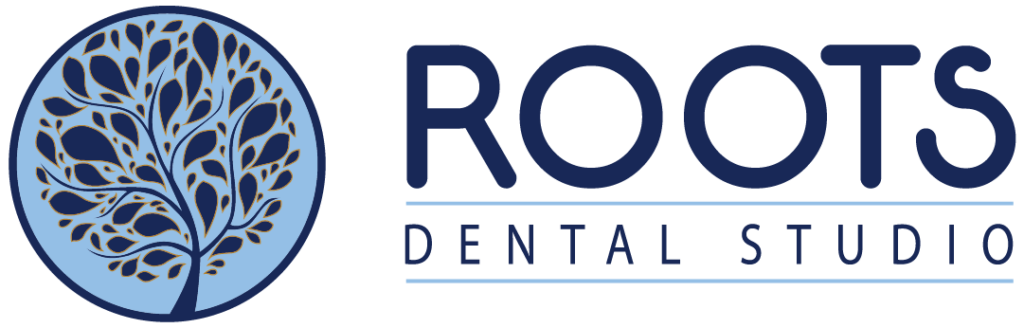 The horizontal logo for "ROOTS DENTAL STUDIO" in features a stylized tree with branches and leaves inside a blue circle, with the text "ROOTS" in bold letters below, and "DENTAL STUDIO" in smaller letters underneath.