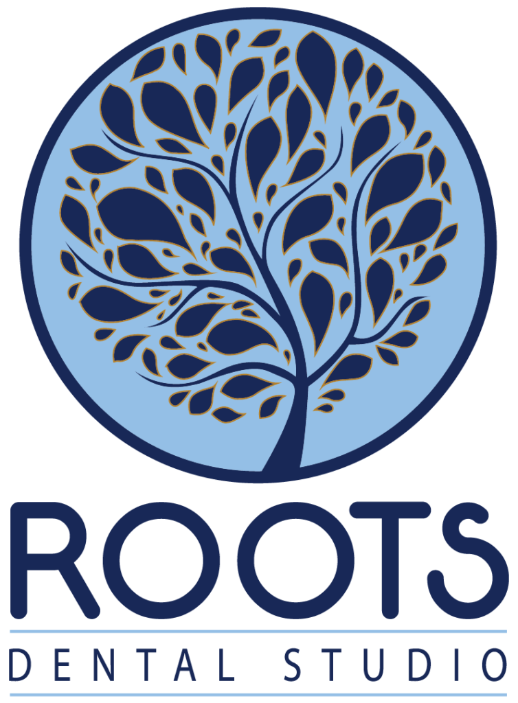 The logo for "ROOTS DENTAL STUDIO" features a stylized tree with branches and leaves inside a blue circle, with the text "ROOTS" in bold letters below, and "DENTAL STUDIO" in smaller letters underneath.