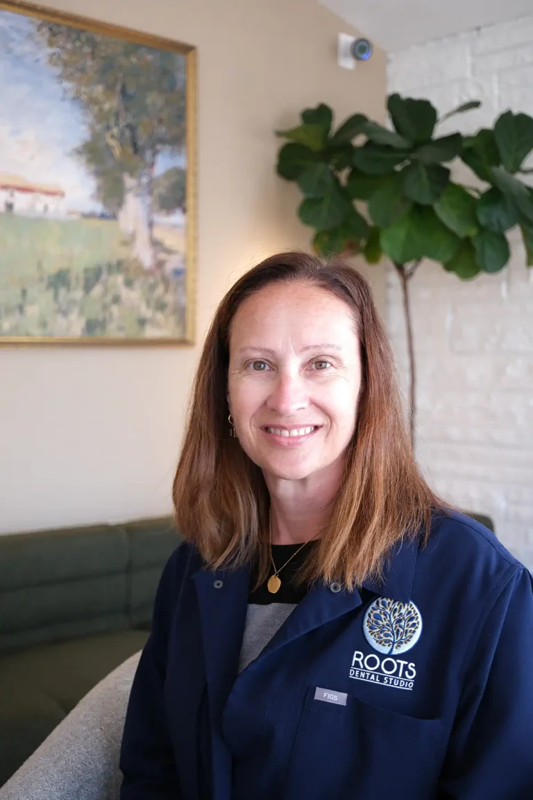 Dr. Julie Romanelli, dentist at Roots Dental Studio in Oak Lawn, IL.