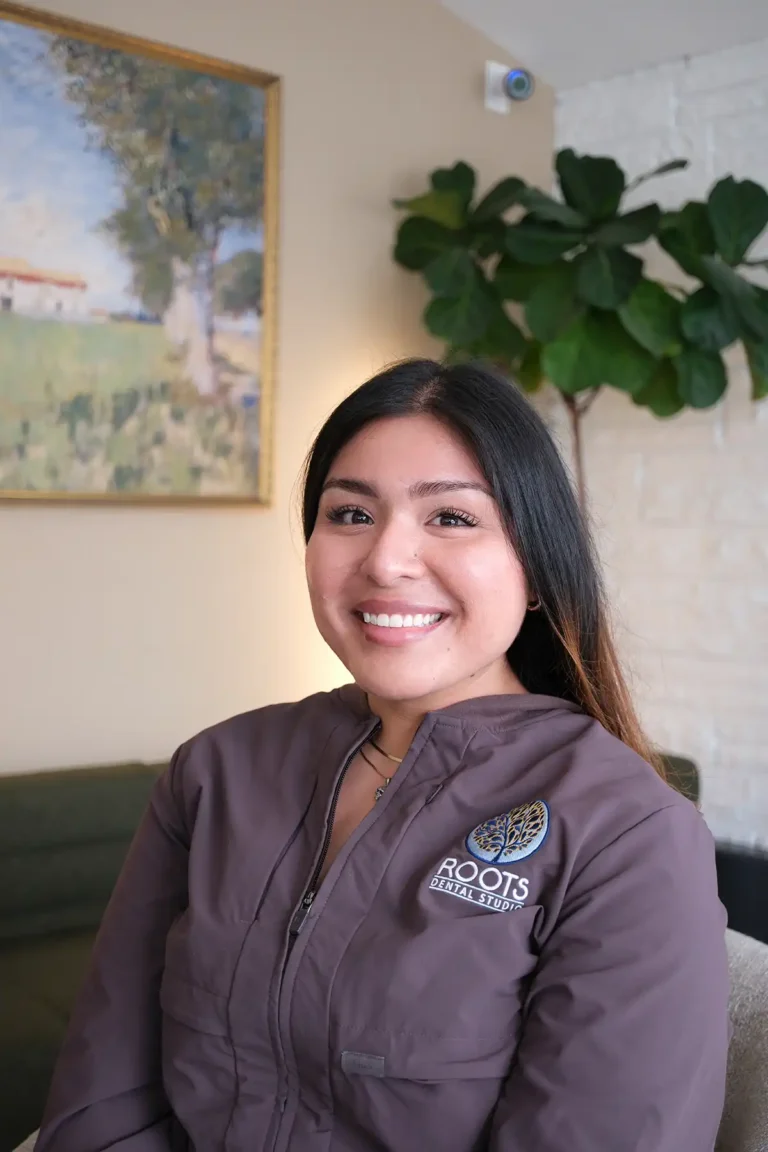 Emily, Patient Care Coordinator at Roots Dental Studio in Oak Lawn, IL.